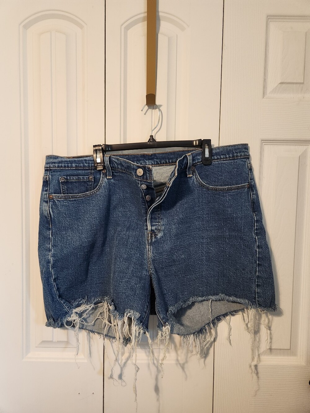 Levi's Distressed High-Rise Denim Shorts in Blue